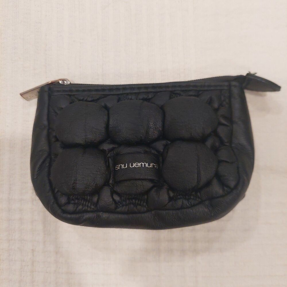black quilted novelty cosmetic pouch from Shu Uemura
